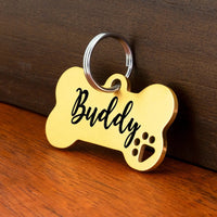 Médaille chien gravée Os minimaliste avec découpe de patte