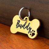 Médaille chien gravée Os minimaliste avec découpe de patte